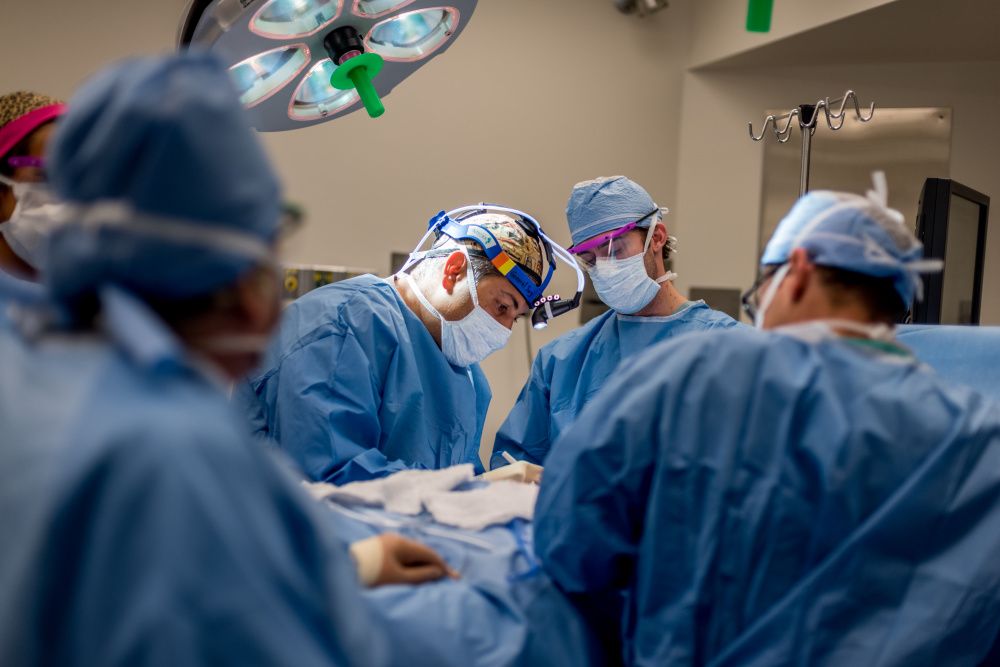 Surgeons performing major cancer surgery in operating room Pune